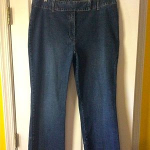 Blue jean pants with double snap and slit on the back of leg in size 14.